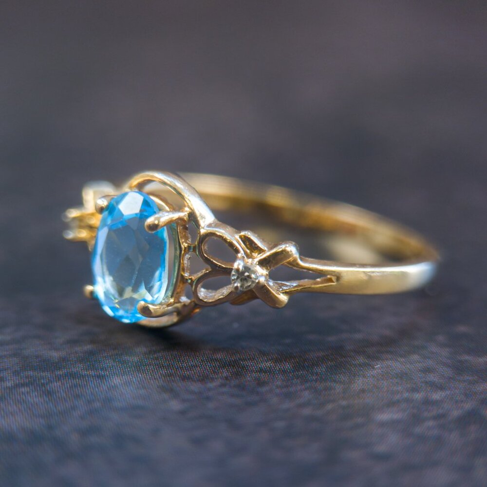 14k Gold Oval Blue Topaz Ring with Diamond Accents - Picture 3 of 15